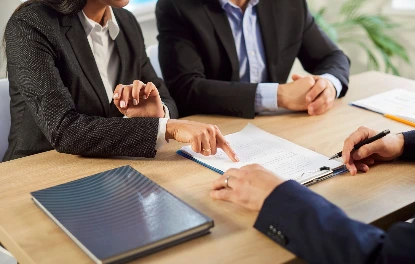 Real estate agent discussing a home with clients