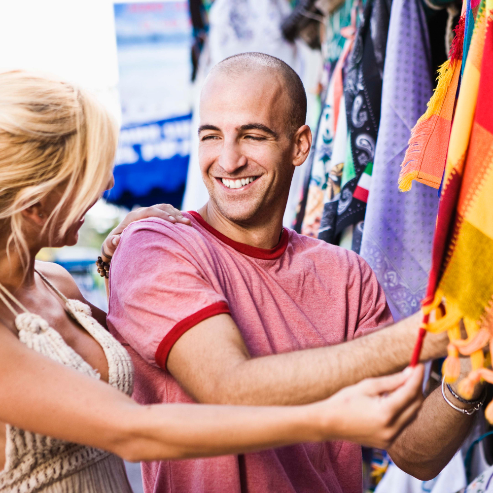 Homes in Mexico - playa del carmen couple shopping - 1000x1000