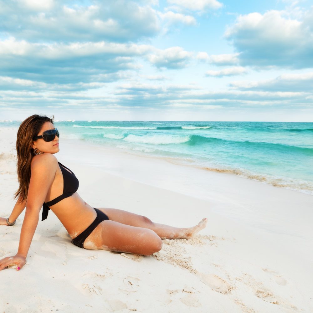 Homes-in-Mexico-woman-in-bikini-beach-playa-del-carmen-o