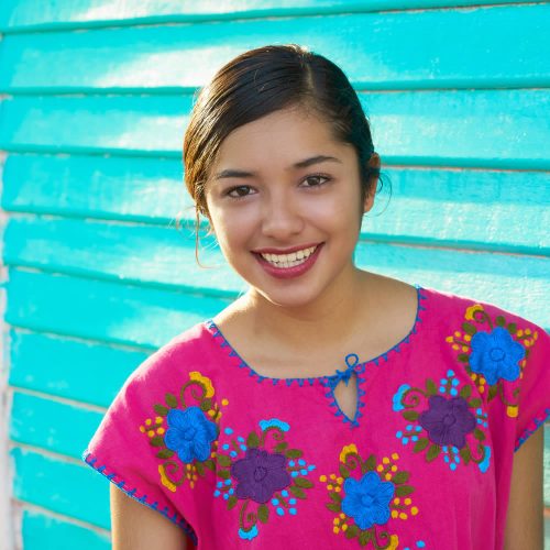 Riviera-maya-smiling-woman-with-tipical-blouse-o